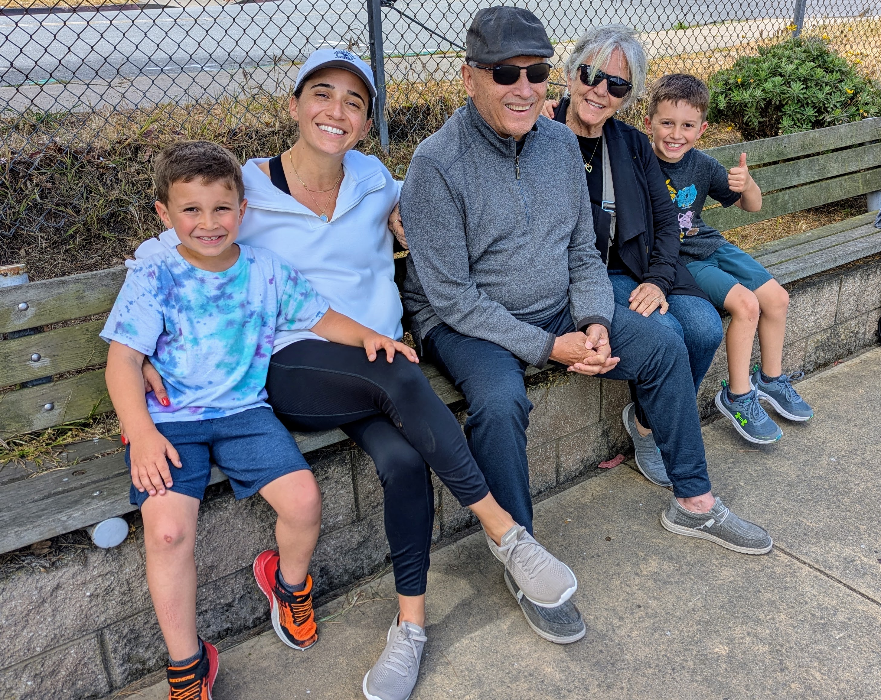 Gina with her father and family